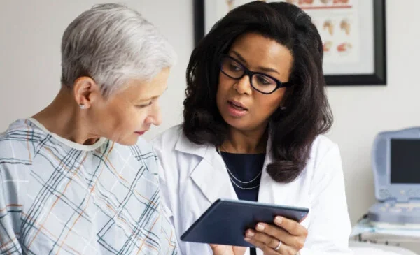 Physician counseling a patient